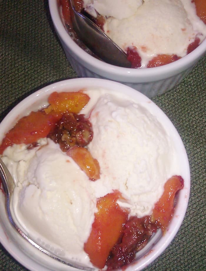Make your favorite ice cream whenever you want! This one's vanilla, served over warm peach berry crisp.