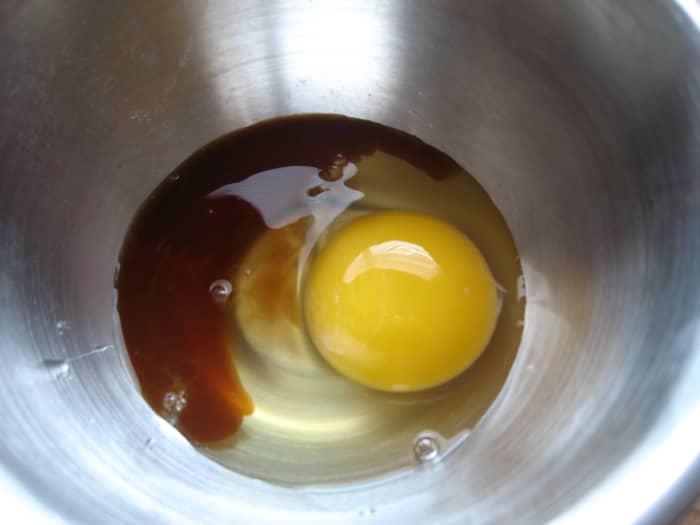Egg and vanilla together. Cut down your labor by consolidating liquids in one container.