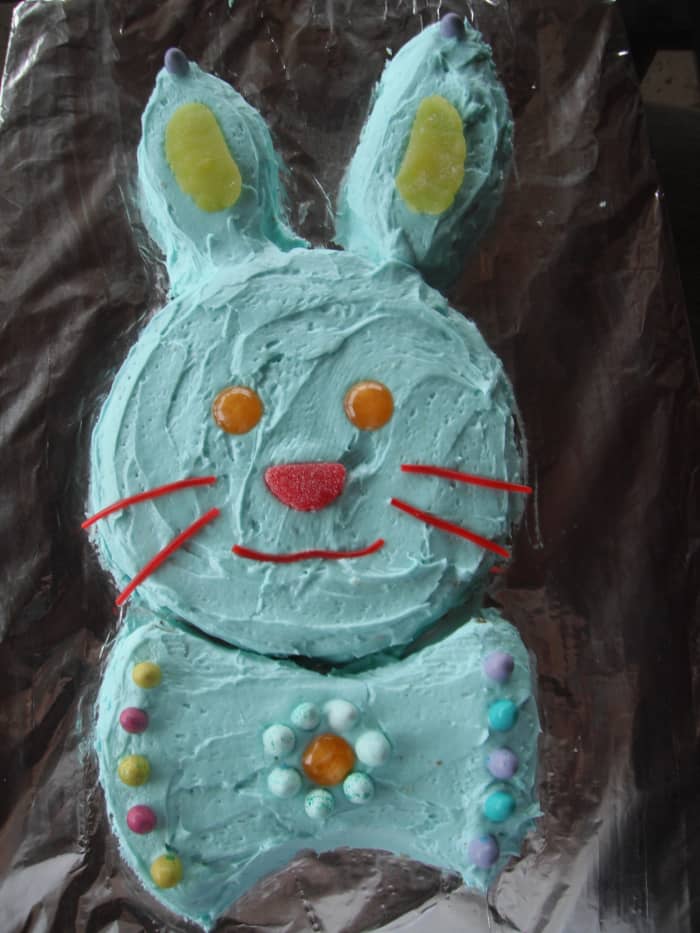 The year we had a blue cake was the year the kids made it all on their own, without my help. They used butterscotch discs for the eyes and "fruit" slices for the nose and ears.