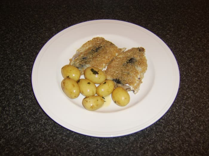 Fresh herring fillets are coated in oatmeal and gently shallow fried before being served with boiled, baby new potatoes coated in butter and fresh garden mint