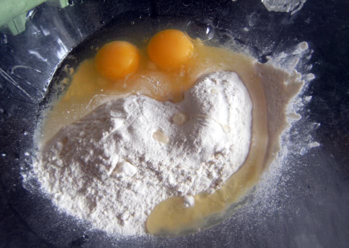 Add the ingredients to a bowl to make the homemade batter.