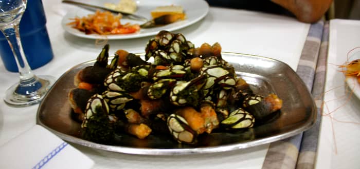 They don't look very appetizing, but you have to try these things called "percebes" (goose barnacles).