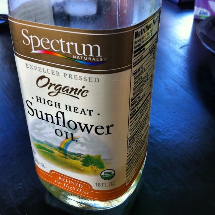 Sunflower oil is refined for high heat and lower in cholesterol than butter, but it still give a golden brown to the chicken skin.