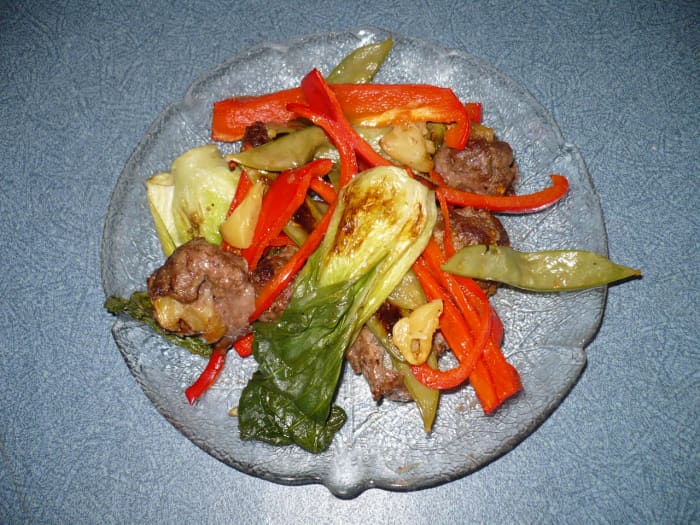 I love garlic, so I placed garlic on top when I plated this dish. It is appealing to the eye and the appetite. What happened to the cauliflower you ask? I got hungry and dipped it into ranch dressing and ate it while I was cooking. Enjoy! Yummo!