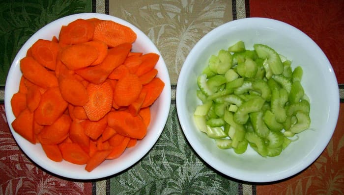 Add celery and carrots. -- After about 4-5 hours simmering, you will add your ketchup, basil, parsley, salt and pepper. You will then make your roux and add it to the soup.