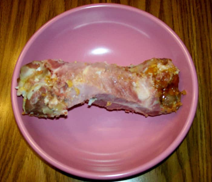 Ham bone ready for soup. It is okay to leave some ham on the bone. It will fall off in the cooking process.