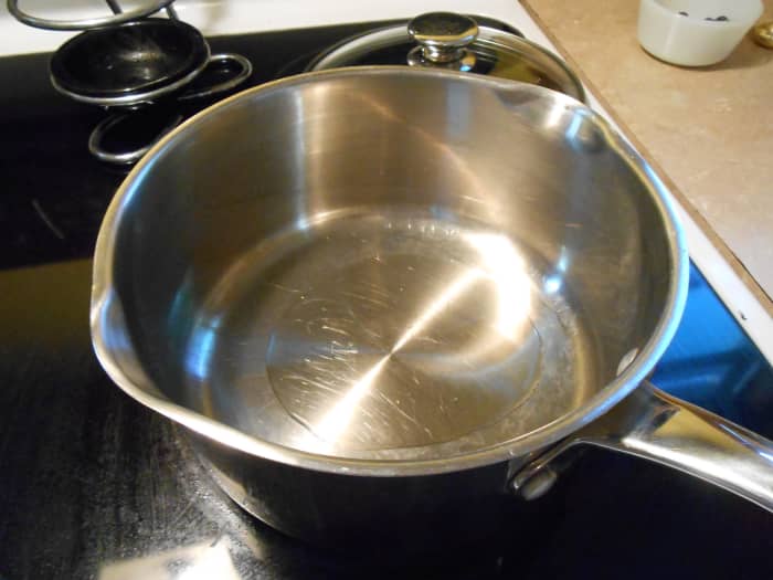 Use a small amount of oil (1 tablespoon or less) to brown the rice and sauté the onions.