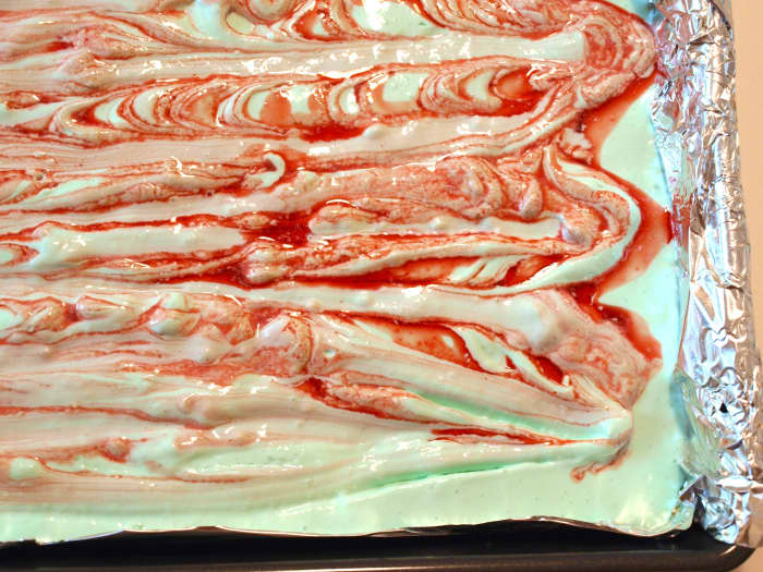 2. Using a fork, knife or other sharp kitchen tool, blend in the cherry gelatin until you are happy.