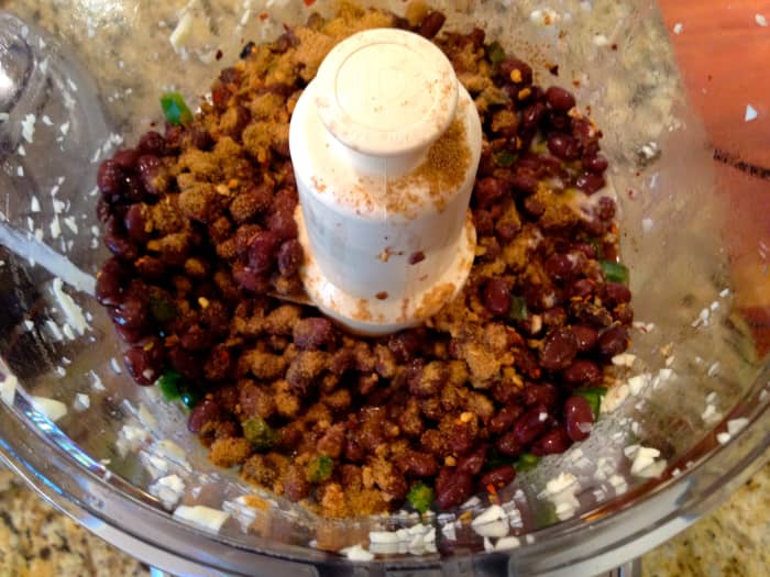 Add remaining ingredients and process until smooth. If the hummus is too dry, add reserved liquid, a little at a time, until desired consistency is achieved.