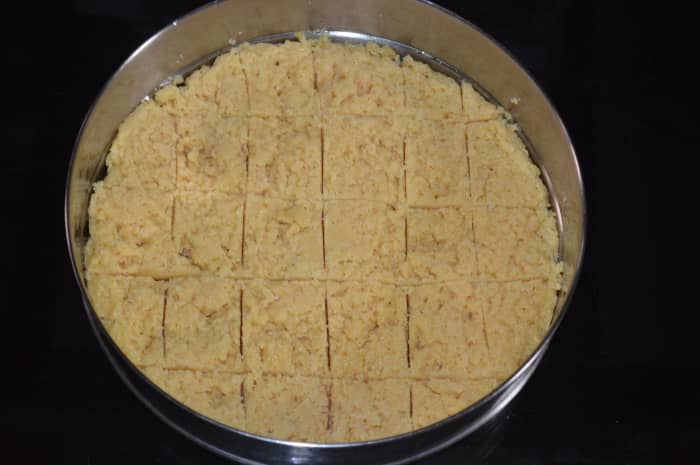 Step 12: Draw square lines on the Mysore pak. Make the lines deeper after 10 minutes. Follow the instructions.