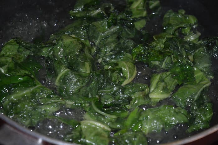 Step four: Add a cup of water. Cook it covering the pan for 7 to 8 minutes or till it cooks completely.
