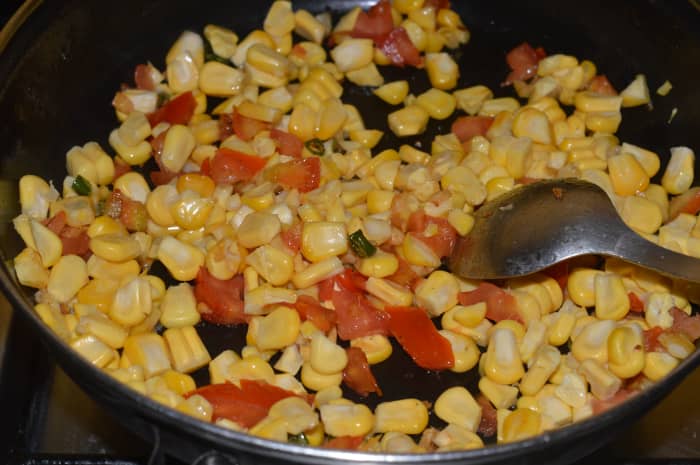 Step 4: Add sweet corn kernels. Stir-cook on high flame for 2 to 3 minutes. Sprinkle a few drops of water if needed.