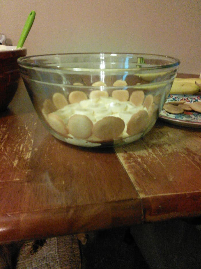 I added wafers around the edge of the bowl. Just for a creative touch. Once you're done layering, put the pudding in the fridge to set.