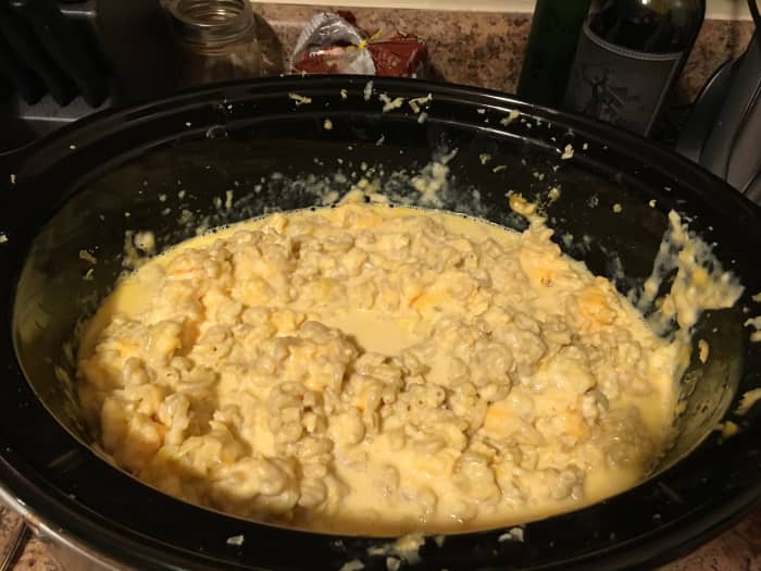 About halfway through the cooking process, the cheese is nice and melted but the pasta is not done yet.