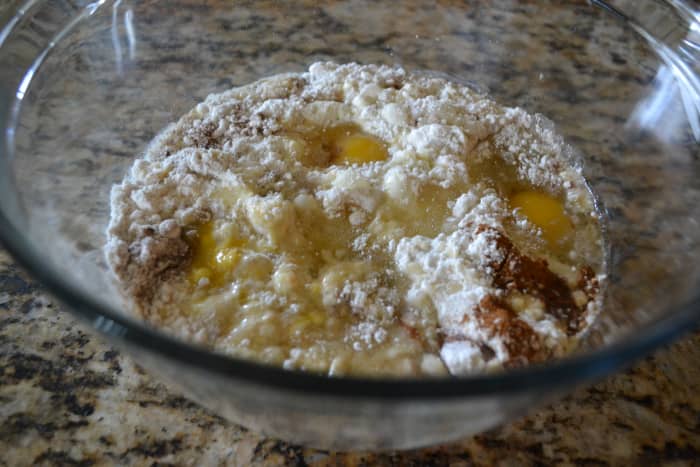 Take a boxed cake mix, add spices as directed in this recipe, add eggs, oil and water as directed on the box, then mix away.