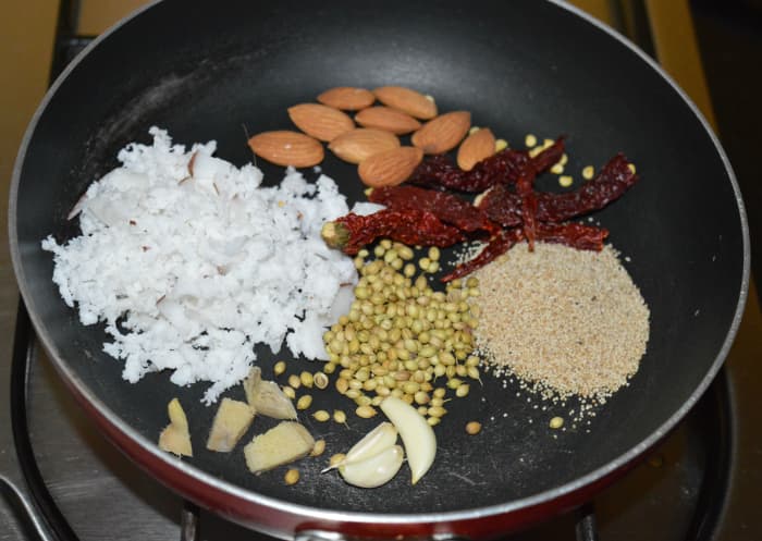 Step 1: Take all the ingredients as per instructions in a pan. Fry them until they become a bit roasted.