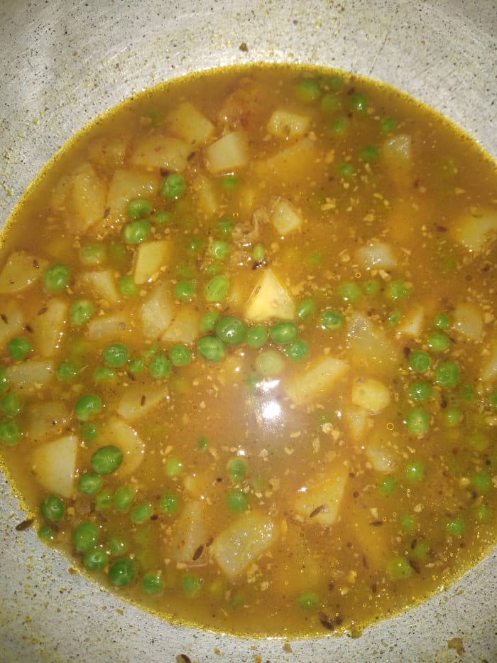 Mix properly. Add 1 cup of water and salt. Cook over low flame for 5 minutes. Don't cook for longer, as vegetables are already cooked.