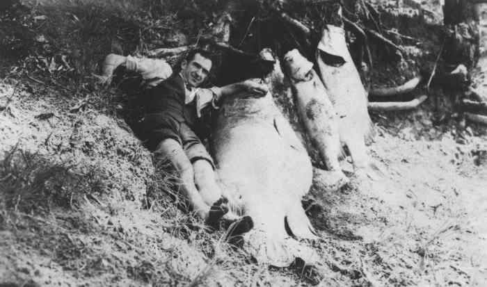 Catch of the day: A Bundaberg resident displays his rum-soused trophies.