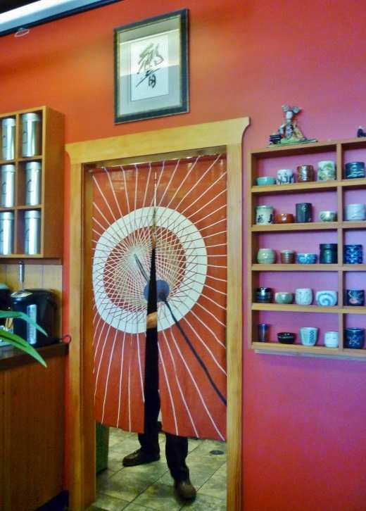 Curtain to the back where the tea is lovingly prepared and brought to patrons in the front.