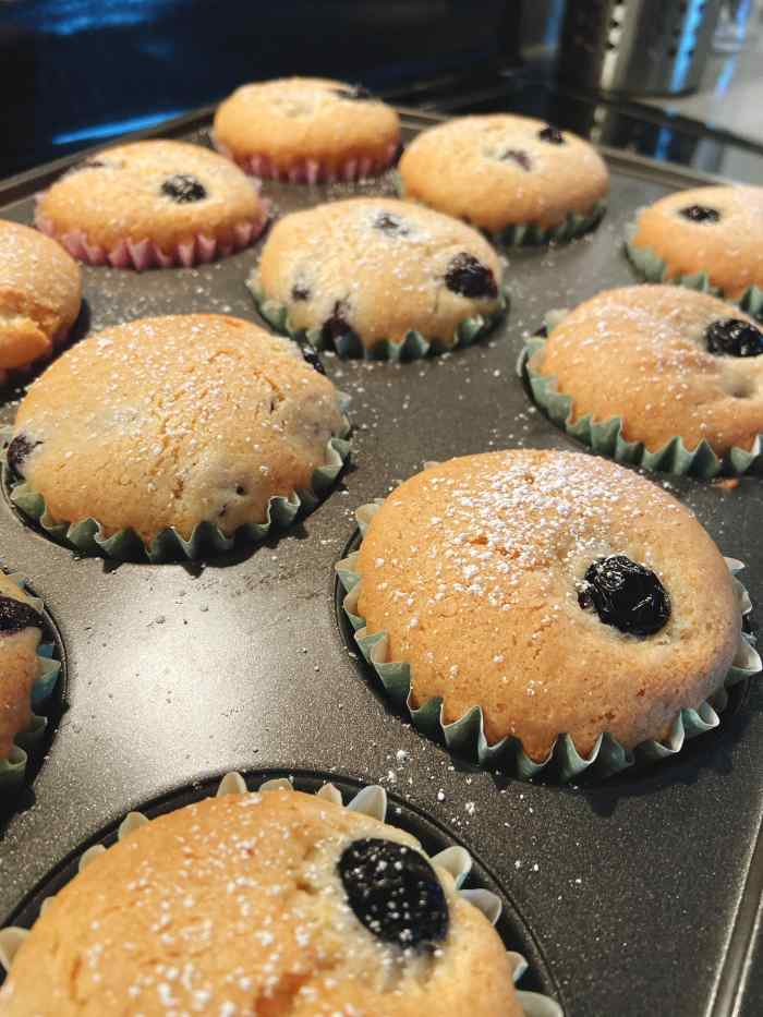 After 28 minutes, the blueberry muffins should be baked. 