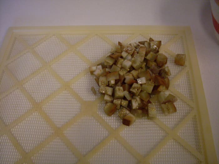 I use a commercial dehydrator to dry many of my foods. I have never tried sun-drying eggplant. Scoop each batch onto the screen...