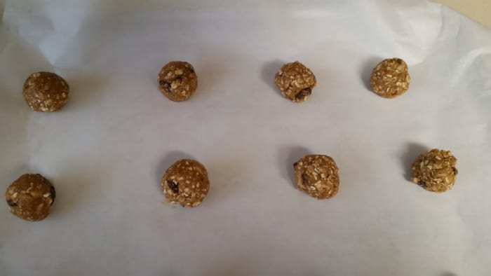 Line up balls of dough on baking sheet lined with parchment paper. Cook allotted time but turn pan once halfway through baking time for perfect cookies.