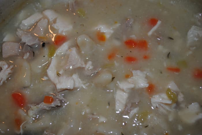 Simmer the dumplings for about 45 minutes to an hour. Watch the temperature, and stir occasionally. They'll stick if they get too hot.