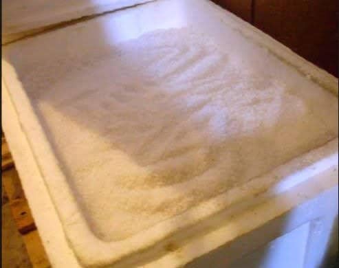 Put a layer of salt in the bottom of the cooler. Coat each egg with grease, then bury it in the salt. Add more salt, and more eggs day by day . . .