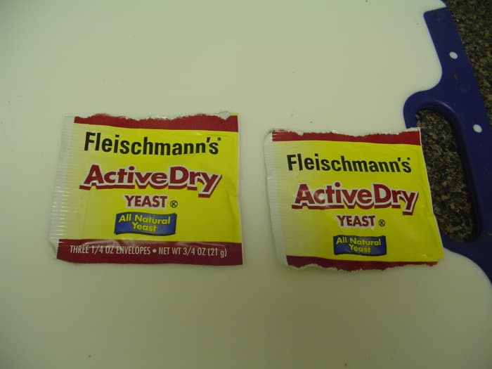 It took me a while to find yeast in a Walmart. The good thing is that they had activated yeast in 7gram packets in the baker's isle