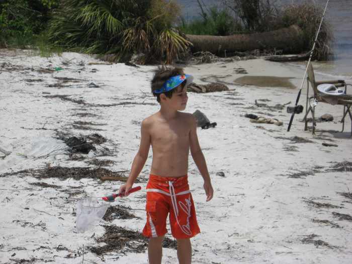 My grandson, Jonathan, on a crab quest.