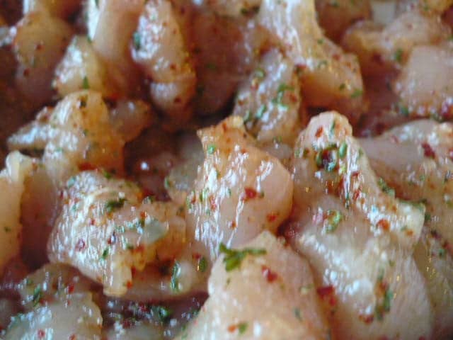 I marinated diced chicken in chili and parsley flakes. You can marinate just prior to stir-frying or allow the chicken to sit in seasonings for half hour. Even overnight.