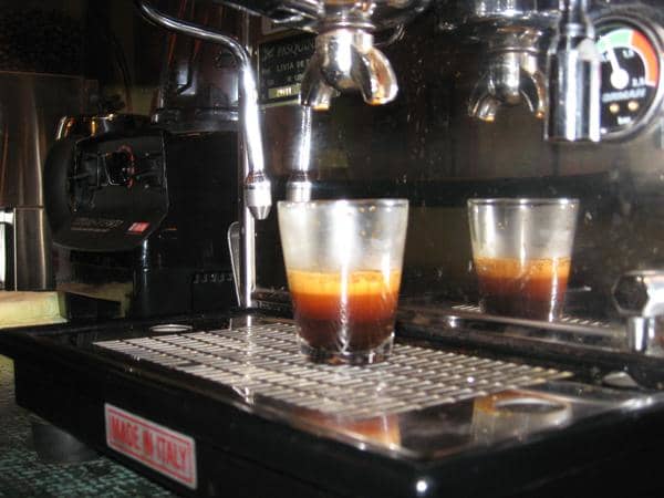 Ask for a "doppio" only if you're ordering a plain double shot of espresso. If you are ordering an espresso drink (a latte or cappuccino) with two shots, ask for "a double" or two shots.