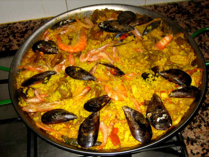 Paella is traditionally served in the same pan that it's cooked in. 
