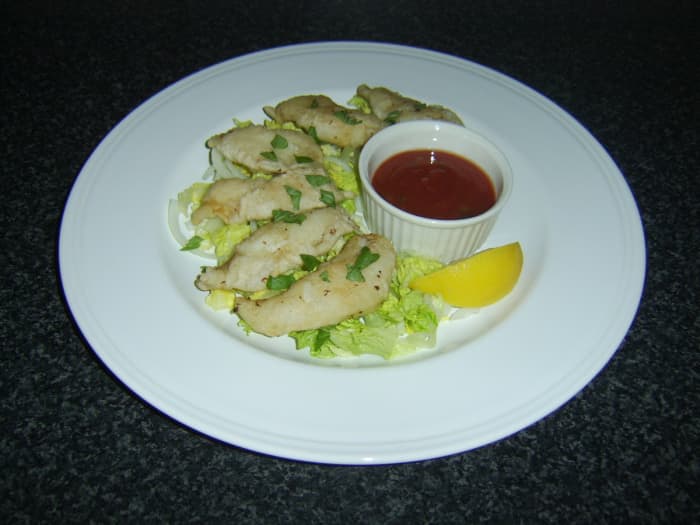Battered pouting goujons served with hot and sweet chilli dip is one of the recipes featured on this page.