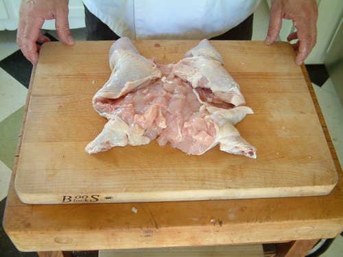 Removing the backbone allows you to open the bird to expose more of the skin to heat, or to stuff and roll the bird as you choose.