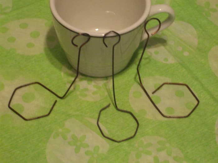 Those egg whatchamacallits. They lift the egg in and out of the cup of dye so efficiently that even a kid can use them.