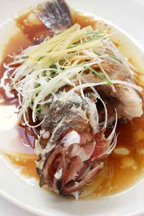 "Clear Steamed" Fish - classic Cantonese cuisine. Image:   uckyo - Fotolia.com