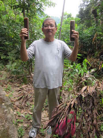 It's me holding the traditional durian cakes