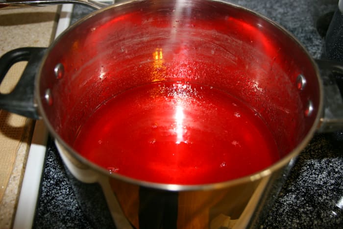 The finished jelly will be viscous, and brilliant ruby in color. The jelly can be canned or refrigerated. If refrigerated, eat within 2 weeks.