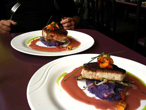 Blackened Ahi on a bed of mashed purple sweet potatoes.