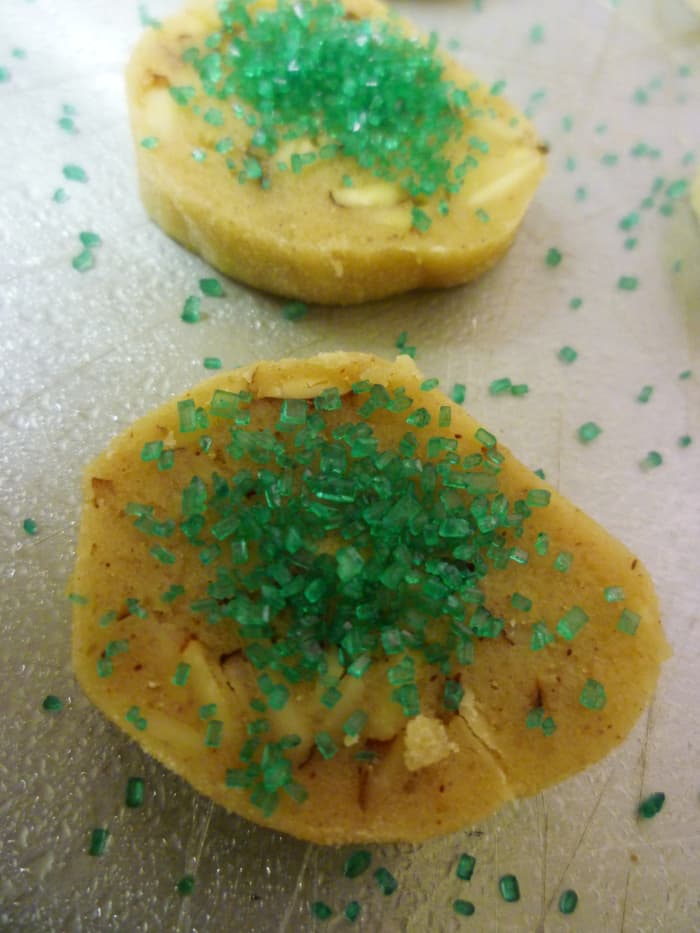 The ice box cookies sprinkled with colored sugar crystals prior to baking.