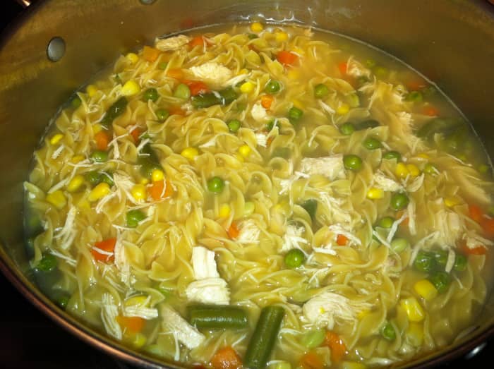 Turkey noodle soup made with diced leftover turkey, mixed vegetables, and egg noodles.