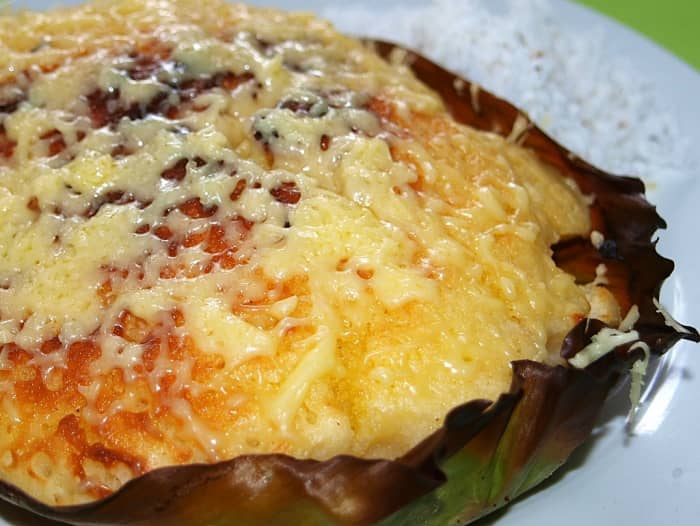 Some freshly made bibingka with butter and grated coconut meat as toppings.
