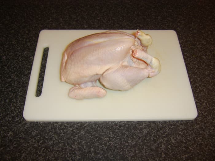 The leg portions, wings, and breast fillets were removed from this chicken to serve a variety of purposes, and the carcass's remainders were used to make the broth.