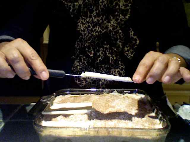 Cut long and even slices of real butter and layer them over the mixture. Make sure the slices are thin and as even as possible.