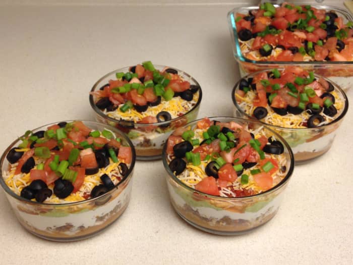What's better than a big dish of 10-layer Mexican dip? How about multiple smaller servings? Shown are 4 two-cup portions and 1 four-cup square dish.