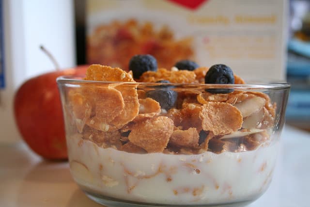 A bowl of cereal with fruit and milk provides a delicious nutritious breakfast, and it is becoming easier to find one that is gluten-free.