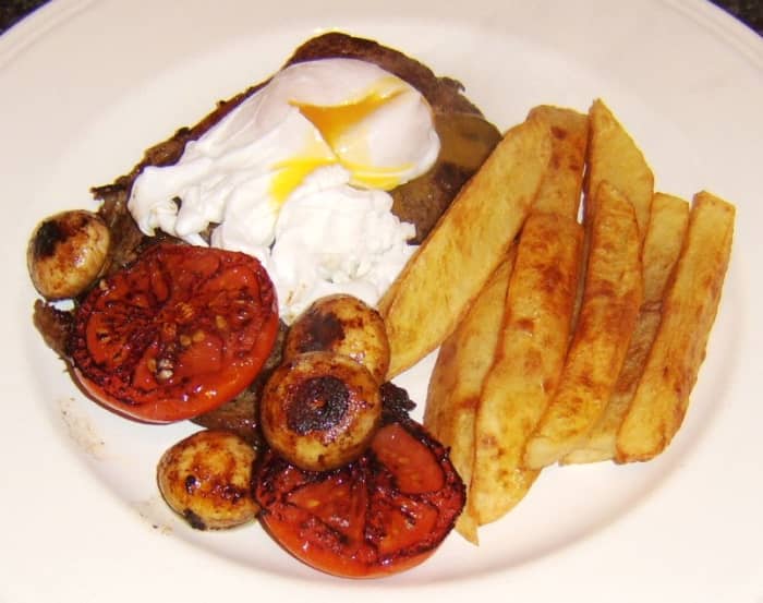 A poached duck egg replaces the more traditional fried chicken egg in this variation of the classic dish, steak, egg and chips