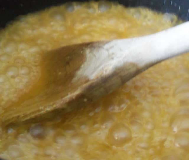The mix should be bubbling nicely. You are looking for large, thick bubbles and for all the sugar to have dissolved.
