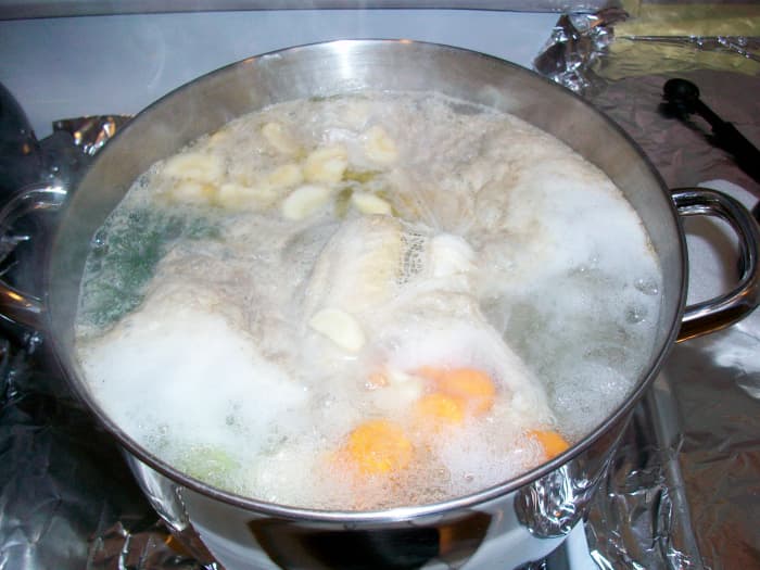 Once the soup starts to boil, cover it most of the way and turn it to medium or medium low to simmer.
